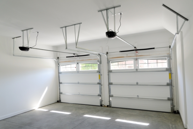 Comment monter une porte de garage sectionnelle motorisée ?