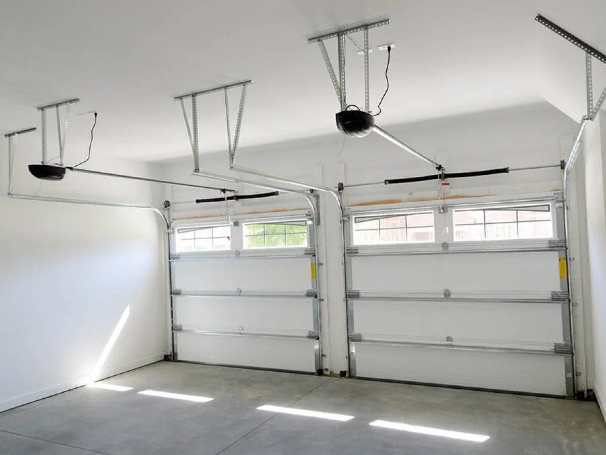 Comment débloquer une porte de garage sectionnelle?