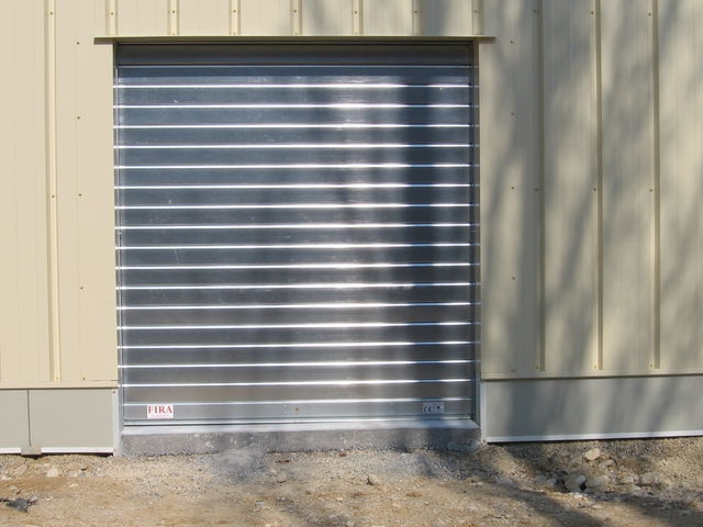 Comment choisir une porte de garage rideau métallique ?