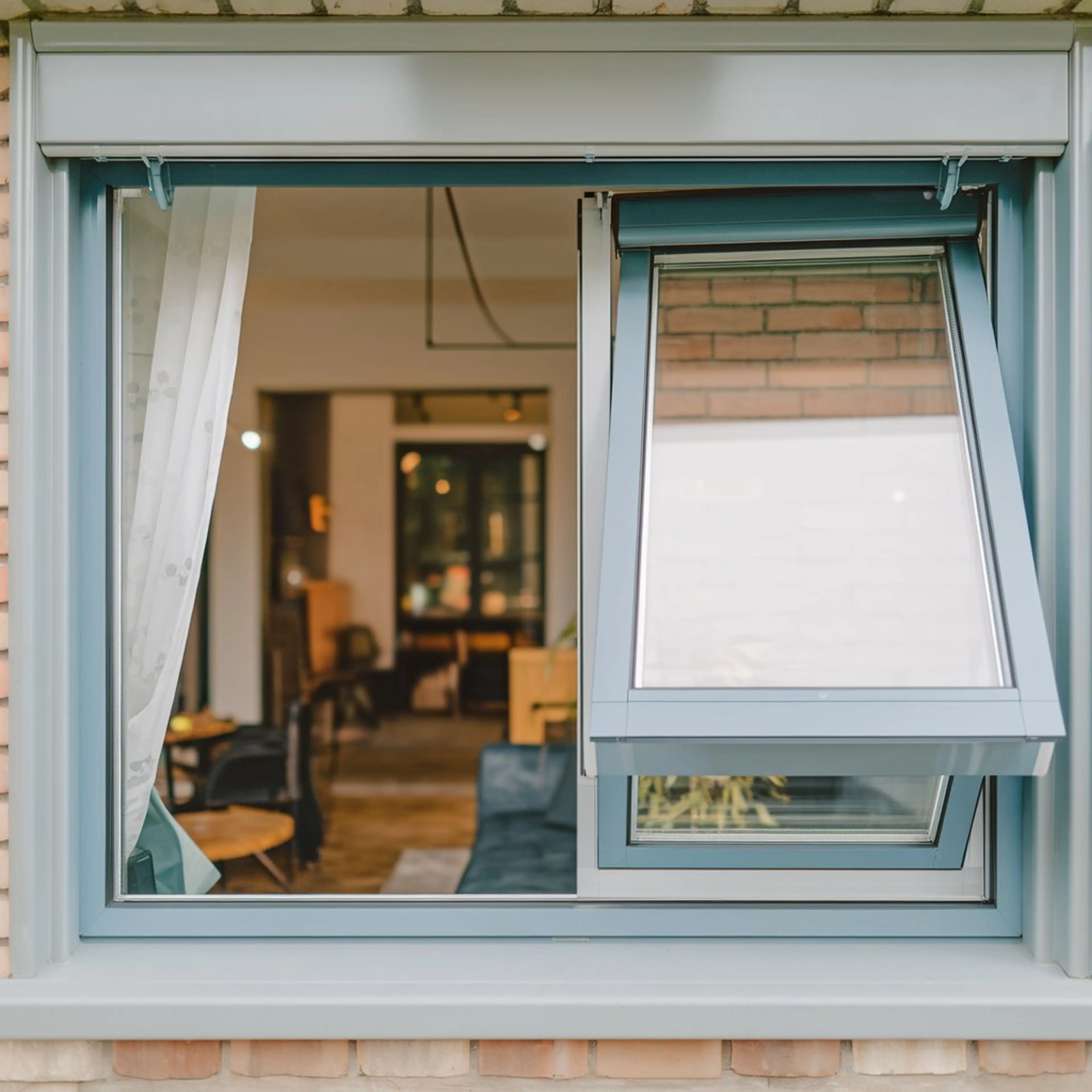 a-photo-of-a-roll-up-window-with-a-blue-_UWjwrCGxQTe9k77DboHMYA_Jl8PtnmERPCqanL7VQHwGA