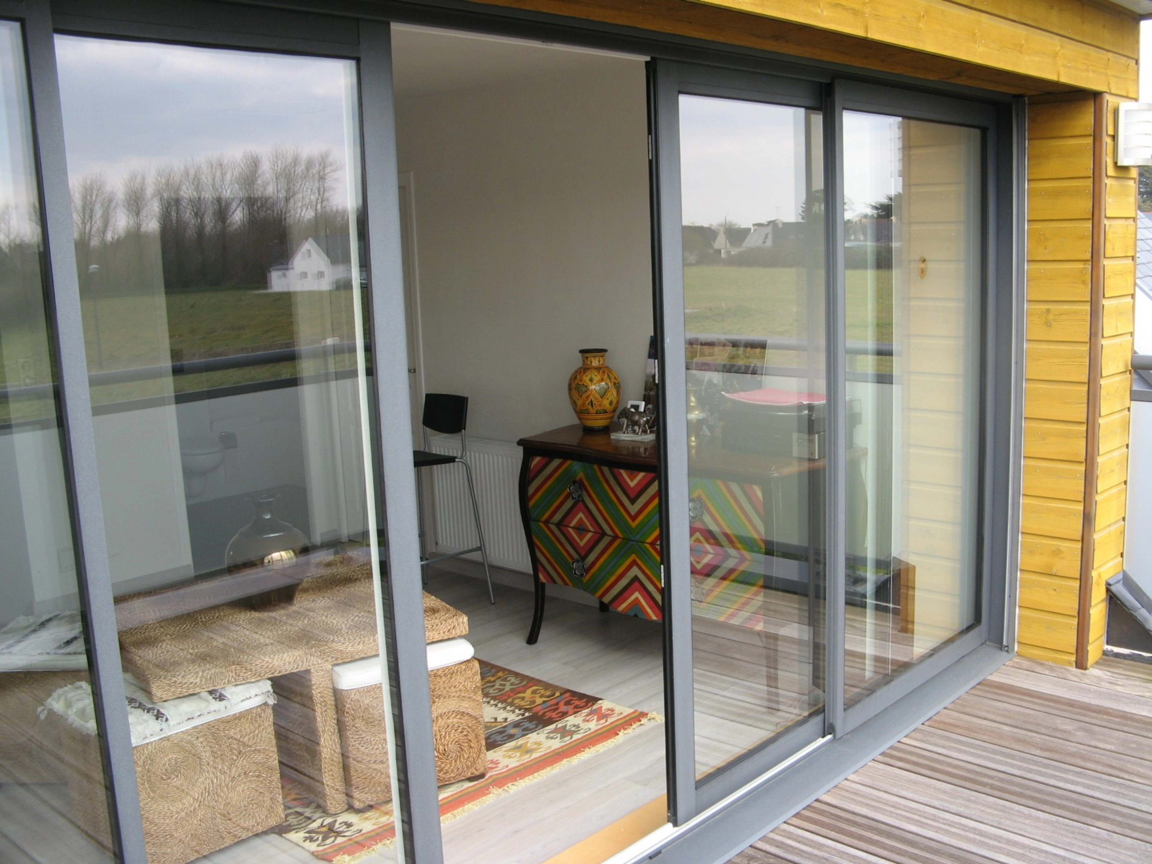 Comment améliorer l’isolation baie vitrée coulissante ?