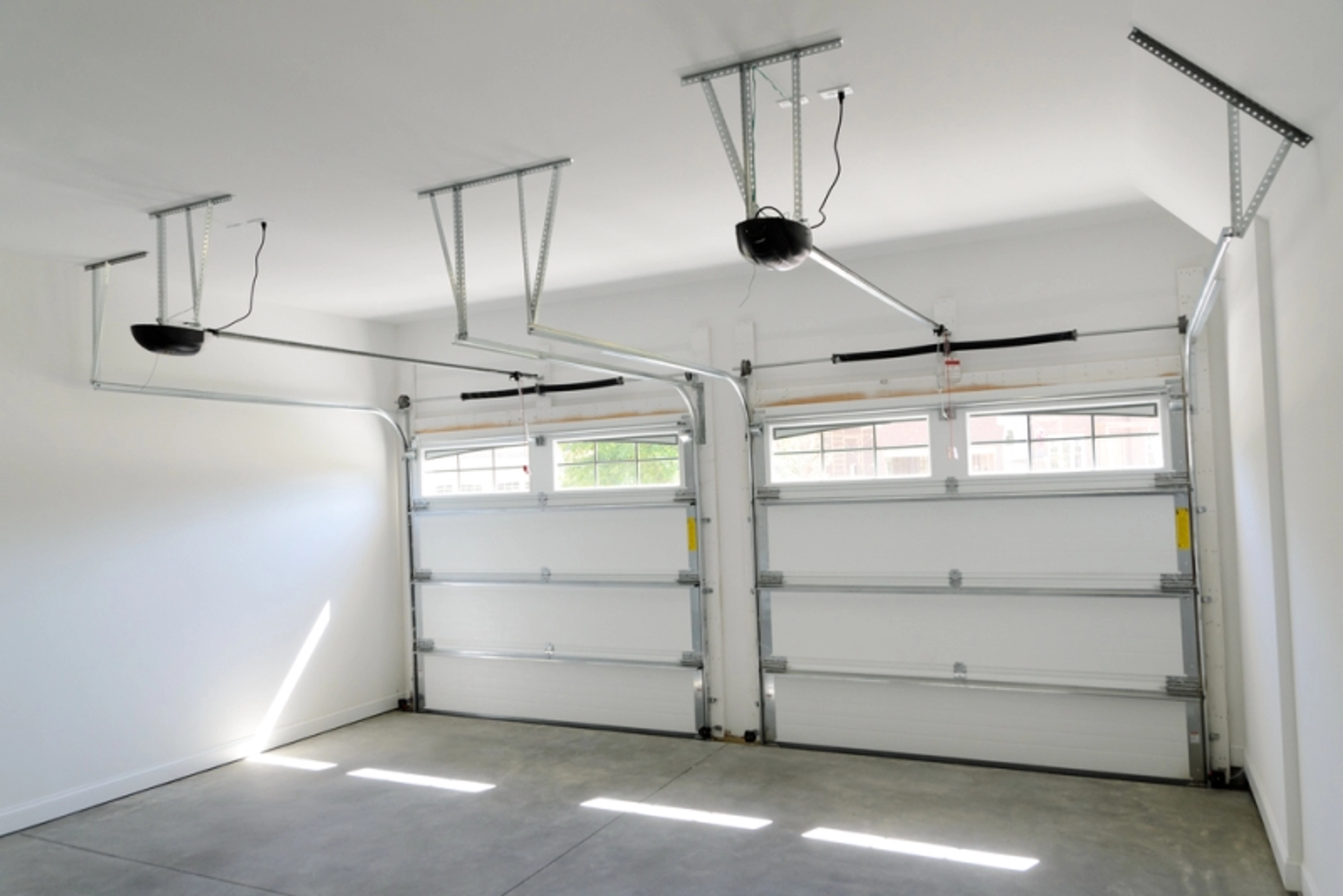 Ressort porte de garage sectionnelle cassé : Solutions ?