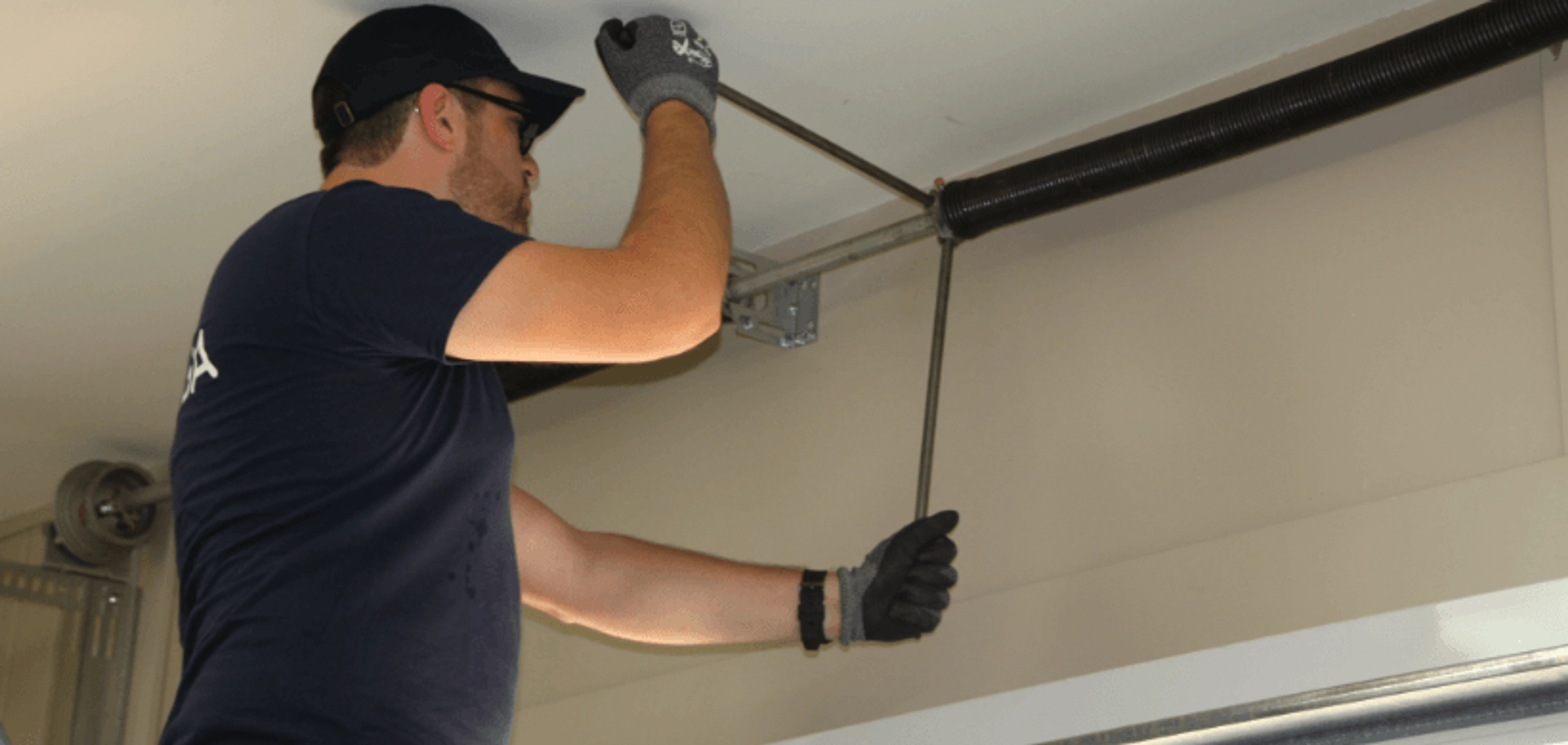 Comment changer ressort porte de garage basculante ?