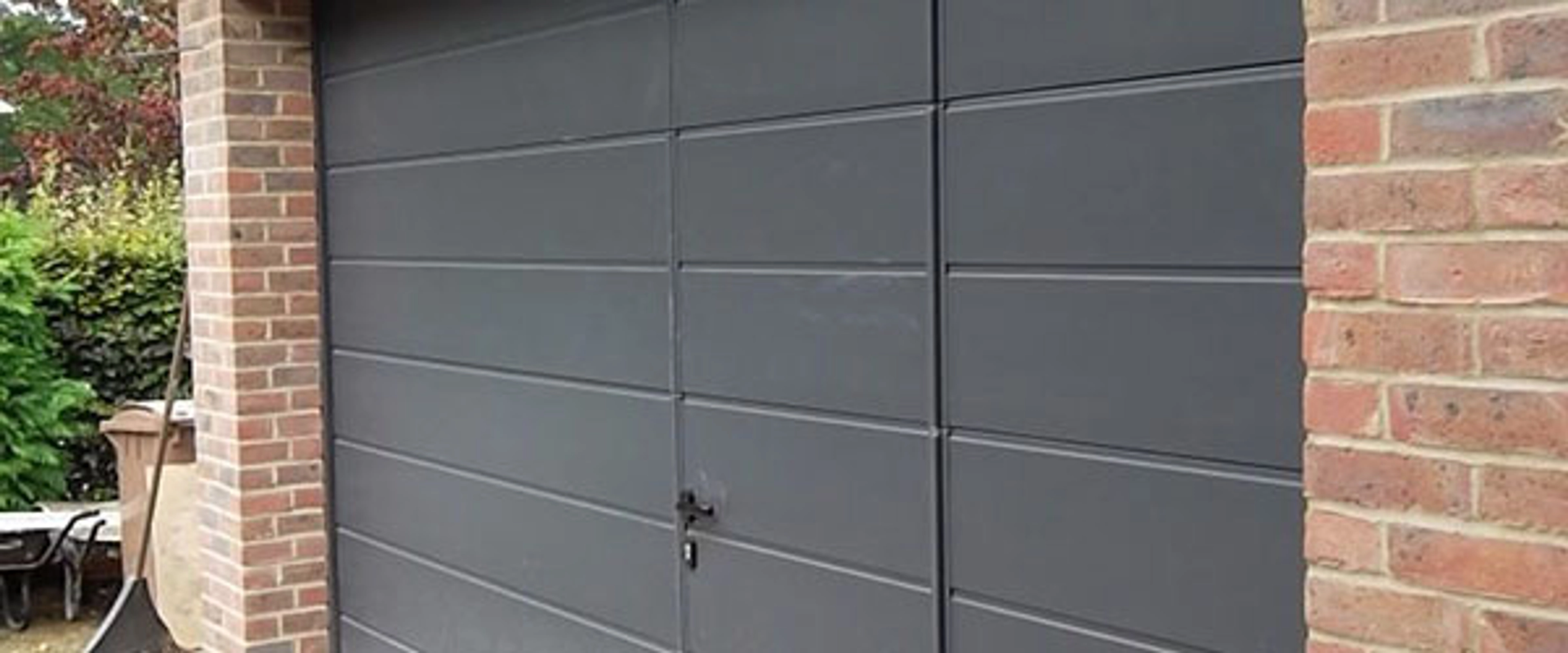 Prix porte de garage sectionnelle avec portillon hörmann