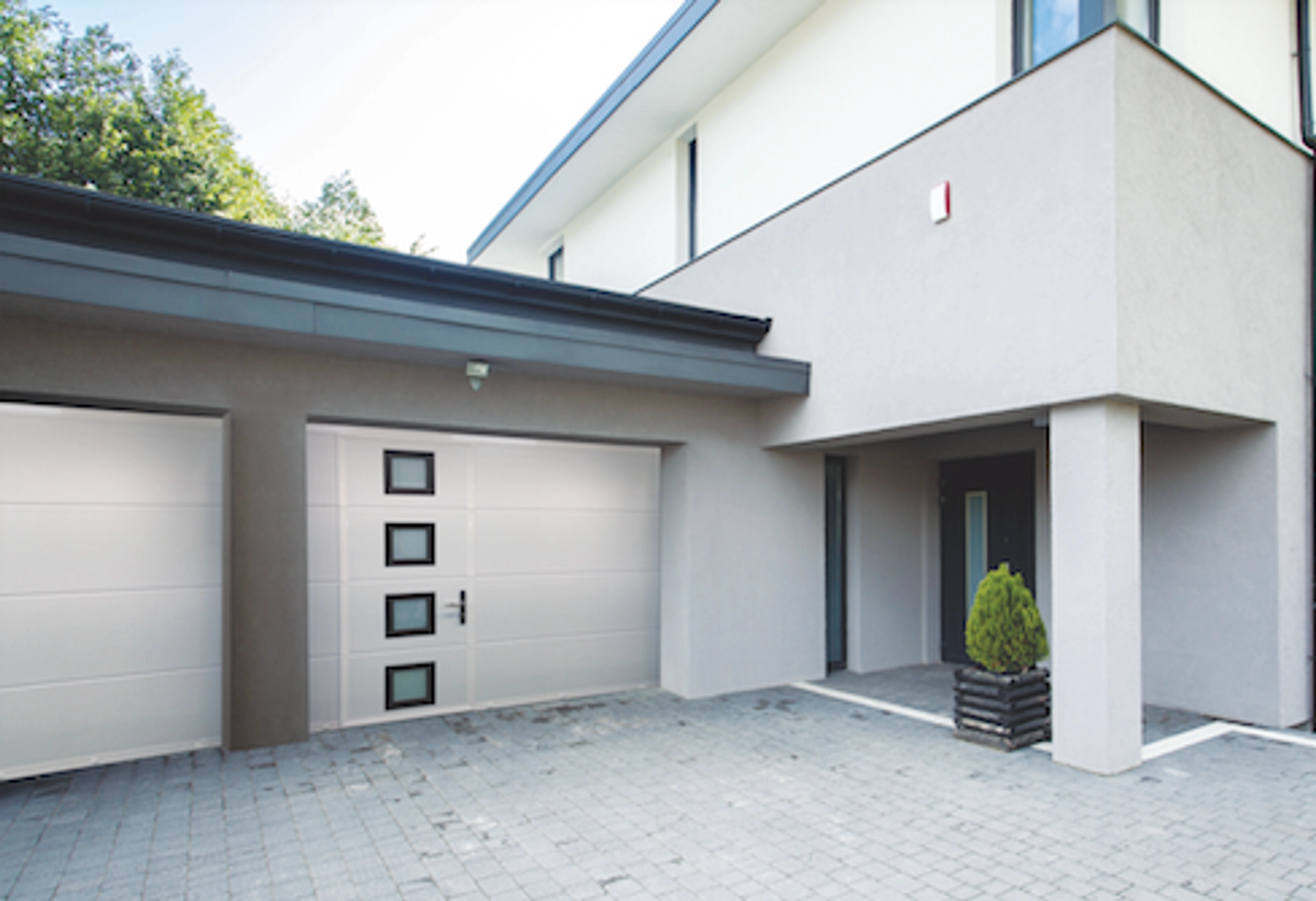 Prix porte de garage sectionnelle avec portillon