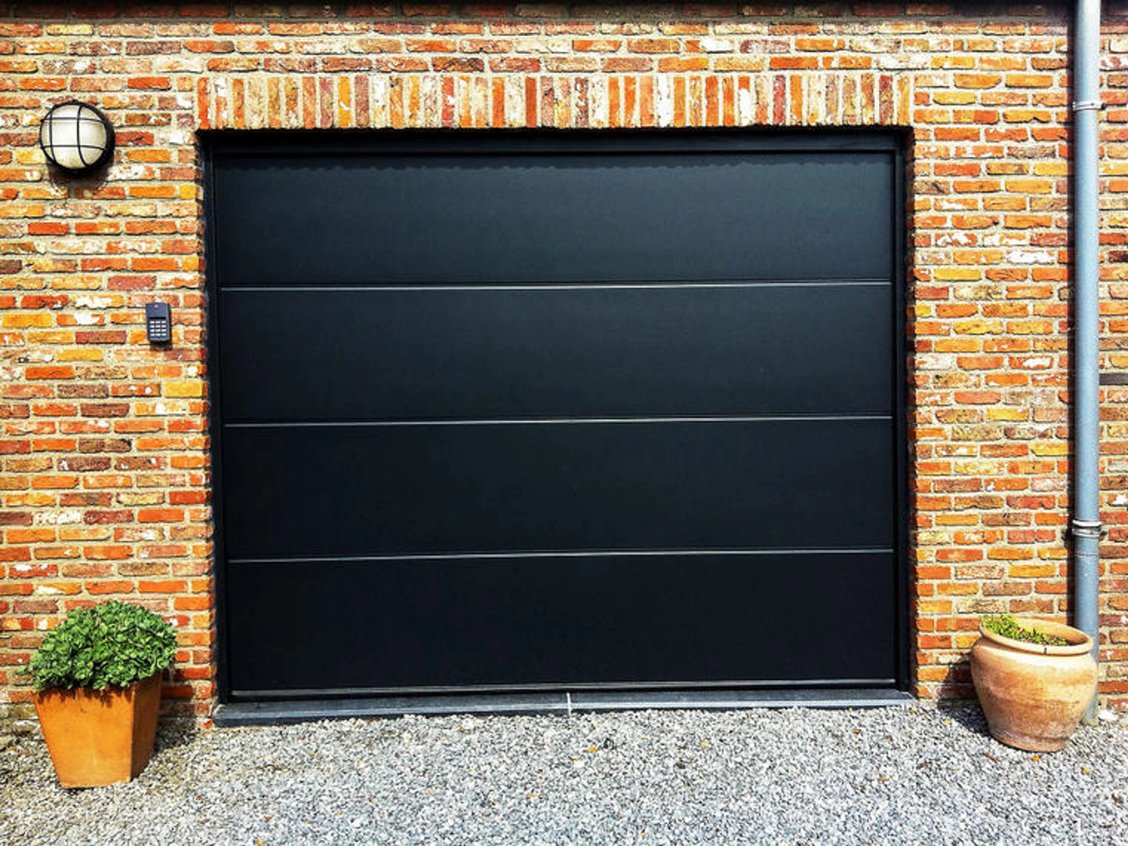 Porte de garage Hörmann ressort cassé : Comment le réparer ?